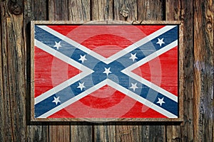 Confederate flag on wooden background
