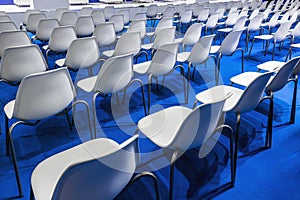 Conference hall, a row of white chairs for business meetings, Conferences