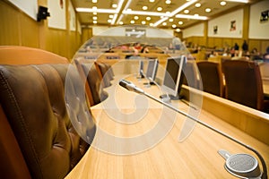 Conference halls with leather armchairs and tables photo