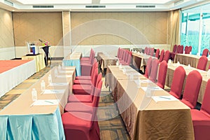 Conference Meeting Room , Row of  Chairs with Stage and Empty Screen for Business Meeting, Conference, Training Course, used as