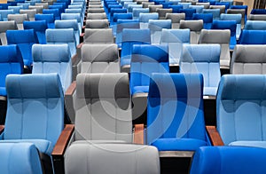 Conference room with many blue and gray seats