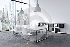 A conference room in a modern panoramic office with New York view. White table, white chairs, a bookcase and two white ceiling lig