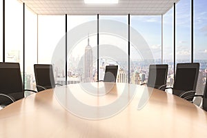 Conference wooden table and chairs in an office with a cityview