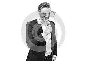 Conferencier man in funny glasses and formal suit speak to microphone isolated on white, emcee