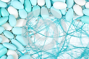 Confetti on blue mesh