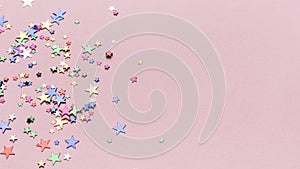 confetti stars pink background with copy space. High quality photo