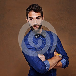 Confidence, fashion and portrait for male person, studio and pose with formal clothing on background. Face, stylish, and