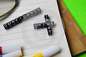 Confidence - value trust message written on wooden blocks. education and motivation concepts