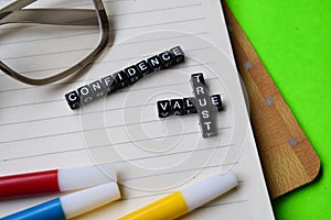 Confidence - value trust message written on wooden blocks. education and motivation concepts