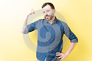 Confident Adult Man Is Posing In Casual