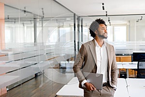 Confident African-American businessman in suit