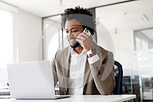 Confident African-American businessman in suit