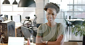 Confident African American businesswoman stands in a business office