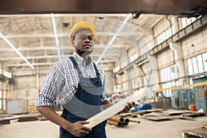 Confident African-American construction manager at workplace