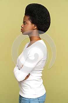 Confident, angry or serious african american woman profile. Black female stand with folded hands