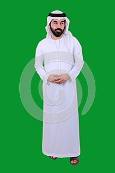 A Confident Arab Middle Eastern Man Standing And Welcoming Smiling And Wearing UAE Emirati Traditional Dress