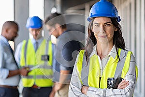 Confident architect at construction site