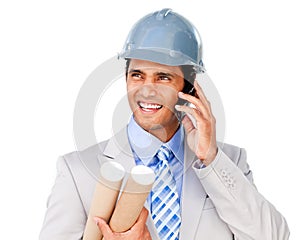 Confident architect on phone carrying blueprints