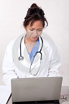Confident asian doctor medical practitioner photo