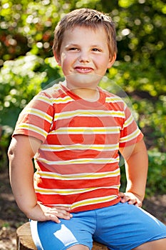 Confident boy in the striped shirt