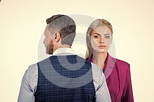 confident business couple in corporate fashion look isolated on white, contradiction