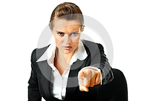 Confident business female pointing finger at you