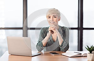 Confident Business Lady At Laptop Posing Sitting In Modern Office
