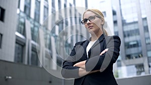 Confident business lady taking challenge, purposeful and smart in achieving goal
