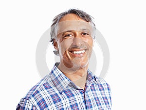 Confident business man. Closeup of mature business man smiling over white background.