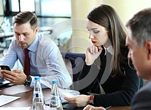 Confident business partners planning work at meeting