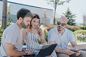 Confident Business Professionals Discussing Strategy in a Sunny City Setting