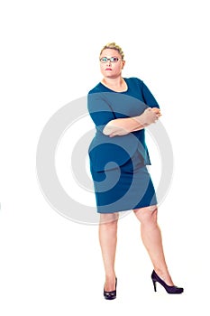 Confident business woman with folded arms in dress