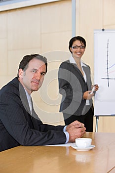 Confident business woman giving presentation