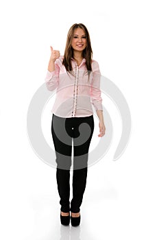 Confident business woman giving thumbs up