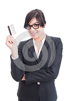 Confident business woman holding a credit card