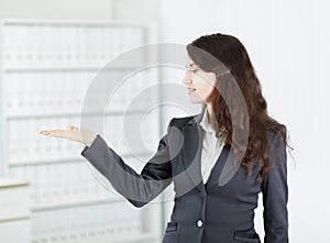 Confident business woman looking on copy space