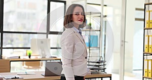 Confident business woman posing in office