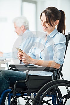 Confident business woman in wheelchair