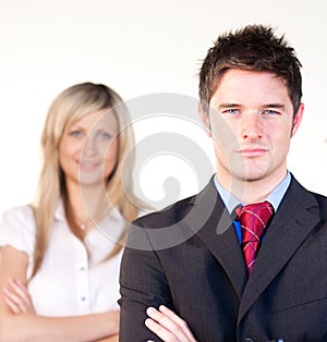 Confident businessman in front of a businesswoman