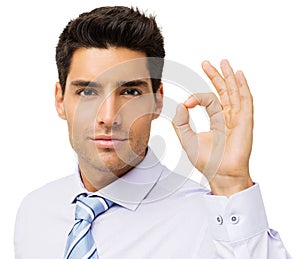 Confident Businessman Gesturing Okay Sign