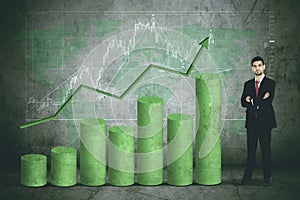 Confident businessman with growing financial graph