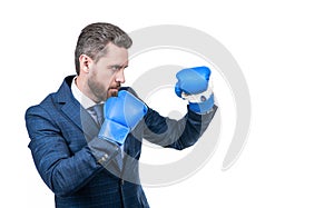 confident businessman man in suit and boxing gloves punching isolated on white copy space, knockout