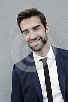 Confident businessman smiling