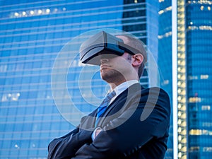 Confident businessman using virtual reality glasses in a business center