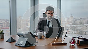 Confident businessman working laptop sitting office closeup. Ceo typing computer