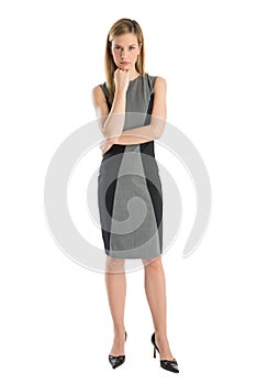 Confident Businesswoman With Hand On Chin