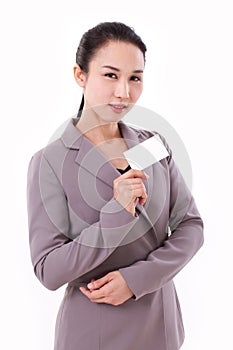 Confident businesswoman holding blank card