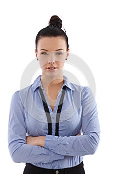 Confident businesswoman standing arms crossed