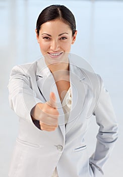 Confident busineswoman being positive