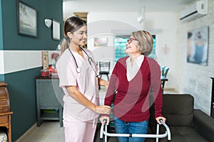 Confident Caregiver Supporting Elderly Patient photo